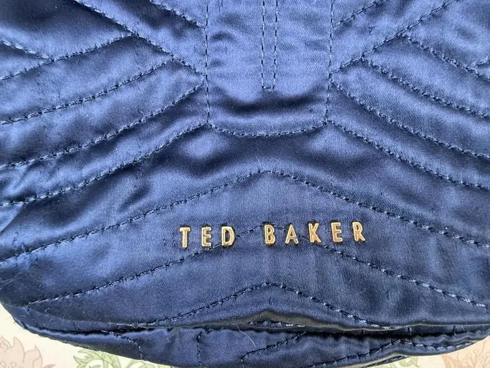 Ted Baker Akija Navy and Rose Gold Quilted Bow Backpack